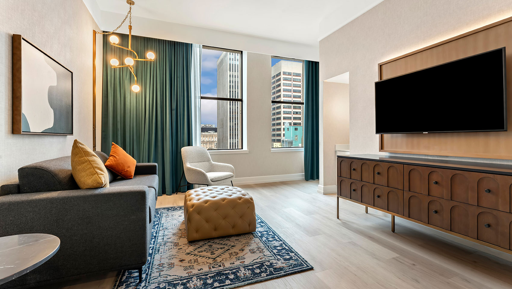 Suite Sitting Area with couch and TV