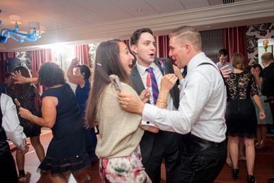 Guest with one of the grooms