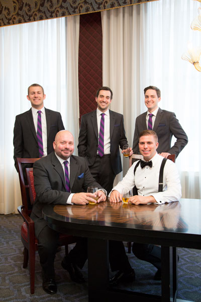 Groom and groomsmen at table